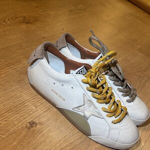 Golden Goose White Sneakers with Gold Star and Yellow Laces